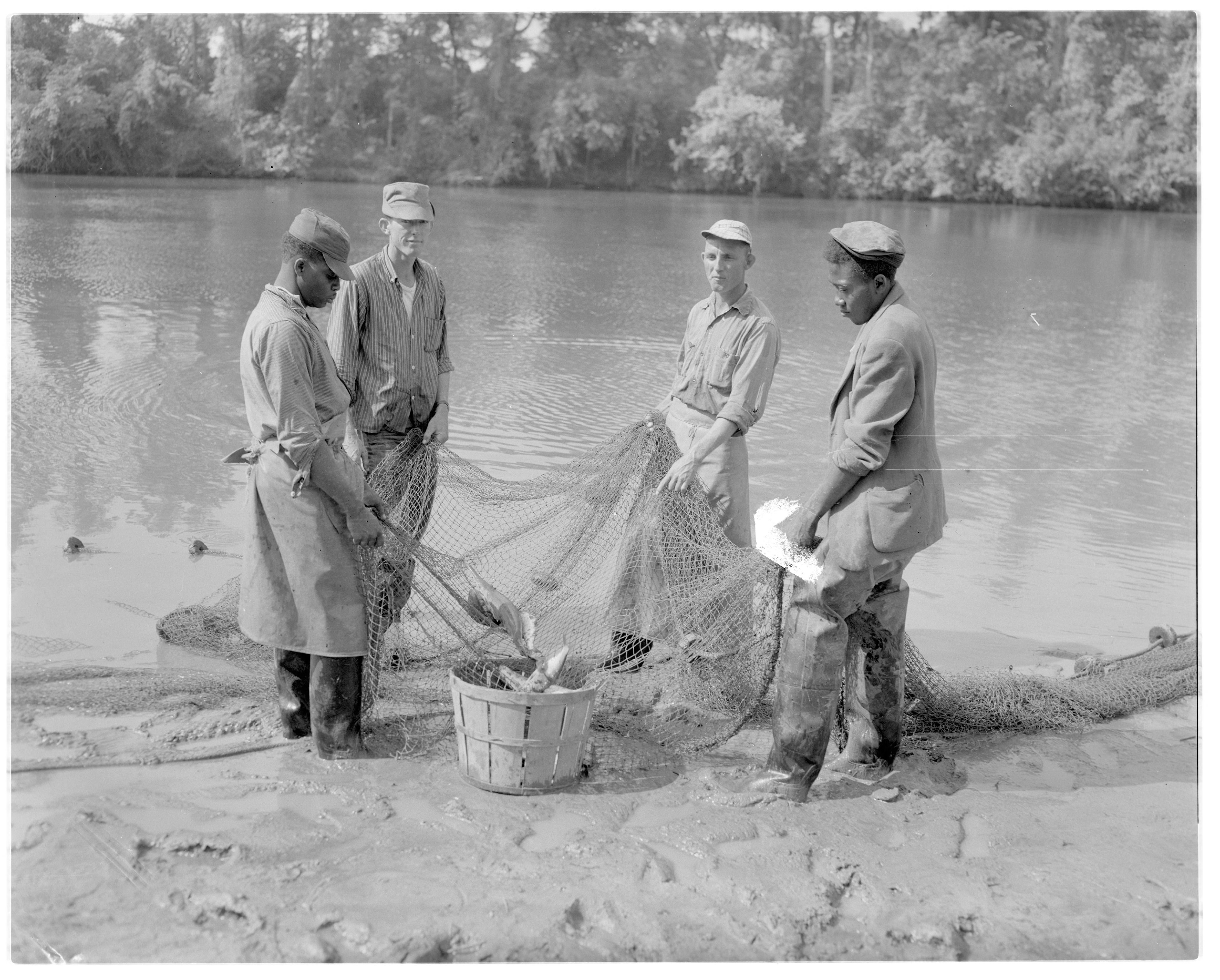 Men holding fishing net