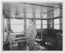 Man steering the towboat "Stanolind A"