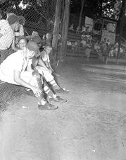 Baseball players on sidelines