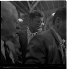 John F. Kennedy inside a tobacco warehouse