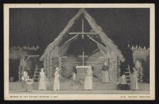 Women of the colony mending a net