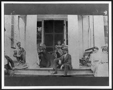 Governor Carr and family on the front porch of Bracebridge Hall