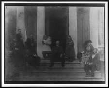 Carr family at Bracebridge on front porch with Mr. Battle of Rocky Mount