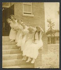 Women on steps of building