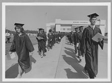 Graduation processional outside Minges Coliseum