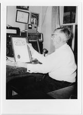 Alpheus W. Drinkwater at his desk