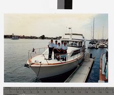 U.S. Coast Guard Auxiliary members aboard a docked patrol boat