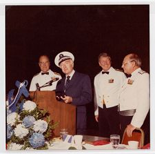 Walter Cronkite and three United States Coast Guard Auxiliary members