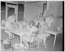 Women canning food 