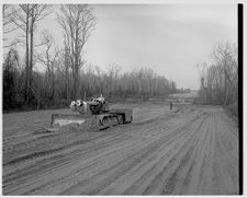 Dirt pusher for highway 13