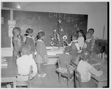 Decorating a tree in school