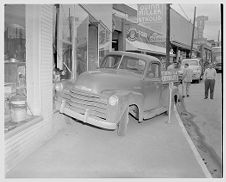 Truck runs into window