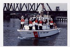 U.S. Coast Guard Auxiliary Boating Safety mascots wearing life jackets