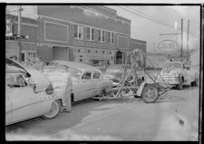 Man with pig; Car wreck (4 Negatives), June 22, 1957