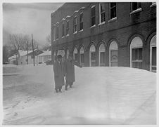 Men looking at snow