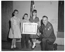 Scroll presented to Elmhurst school