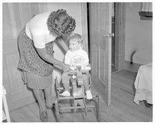 Child on rocking horse