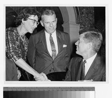 JFK shaking hands