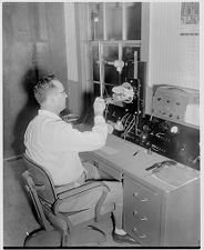 Man at control panel 