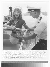 Actress Angel Tompkins and actor Lloyd Bridges on a boat