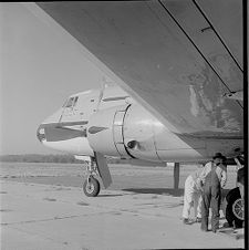 Inspecting airplane