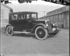 Car parked by Marietta Mfg. Co. building