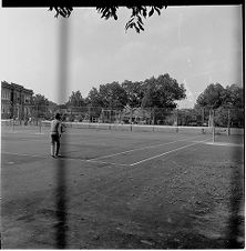 Playing tennis