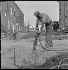 Man breaking cement 