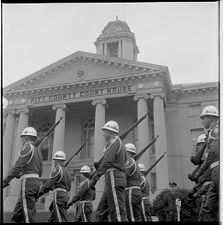 Marching by courthouse