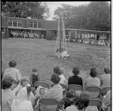 Sitting around maypole