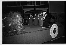 Girls praying on float