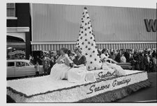 Waving from float