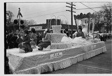 Waving from float