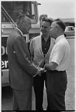 Moore talking with men