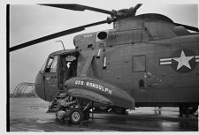 Helicopter USS Randolph and its Navy Crew