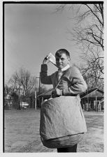 Boy delivering the Daily Reflector 