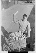 Boy delivering the Daily Reflector 