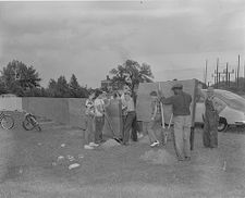 Putting up boundary for ball field 