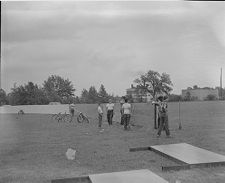 Putting up boundary for ball field 