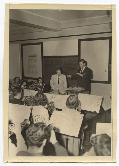 Herbert Carter monitoring student conductor