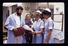 Nursing faculty preparing a lab