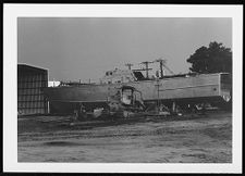 Osprey:  Portside view of boat on land