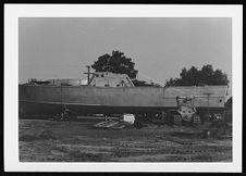 Osprey:  Portside view of boat on land