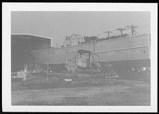 Osprey:  Portside view of boat on land