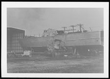 Osprey:  Portside view of boat on land