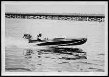 Small one/two person boat out on water. Collection :  Barbour #758 Misc. Photos.