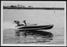 Small one/two person boat out on water. Collection :  Barbour #758 Misc. Photos.