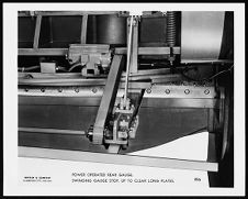 Power Operated Rear Guage. Swinging Guage Stop, up to clear long plates