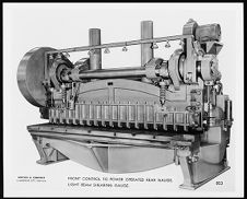 Front Control To power operated rear guage.  Light beam shearing guage.