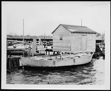 Misc. Photo.  "Joy Boy"  Small boat on dock